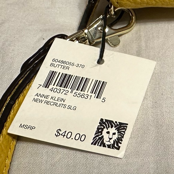 Brand new Anne Klein small wristlet w/ tags in a bright yellow color. - Picture 4 of 4